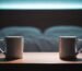 Two coffee mugs on opposite sides of a nightstand, representing the emotional distance and loss of intimacy in a sexless marriage.