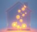 A glowing conceptual house with connected spheres of light, representing integrated family and marriage counseling.