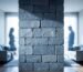 A stone wall in the middle of a living room, symbolizing stonewalling and the silent treatment in relationships.
